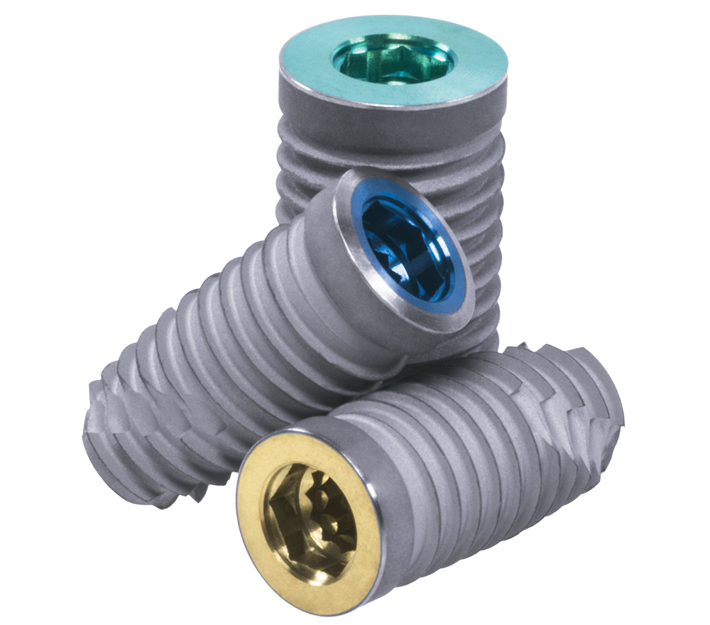 Three ZimVie dental implants with Osseotite® surface technology designed to support faster healing and strong fibrin attachment. The unique acid-etch process creates a 1–3 micron peak-to-peak surface, enabling fibrin strands to securely entangle for stable clot integration and early bone formation.