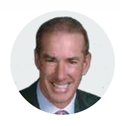 A professional headshot of Dr. Richard Mecall, DDS, from Las Vegas, NV, who provides a testimonial on the benefits of the Navigator System. His quote highlights how the system allows for the immediate delivery of a provisional prosthesis, which enhances the patient experience by giving them a smile the same day as their surgery.