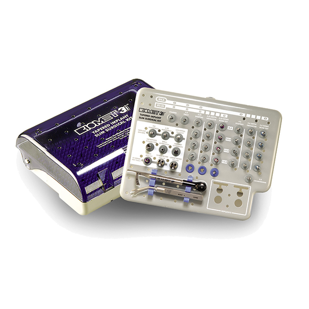 Tapered Implant Slim Surgical Kit, featuring a full set of implant drivers, depth indicators, shaping drills, bone taps, countersink tools, and handpiece connectors. The organized tray layout supports precise implant placement with labeled components for efficient surgical workflows.