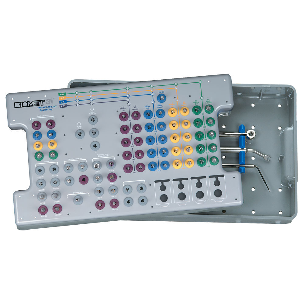 Tapered Implant Surgical Kits, including the QNTSK Premium Kit and a companion Dense Bone Tap Kit. The trays feature organized, color-coded components for implant procedures, designed to streamline surgical workflows and ensure precision during implant placement.