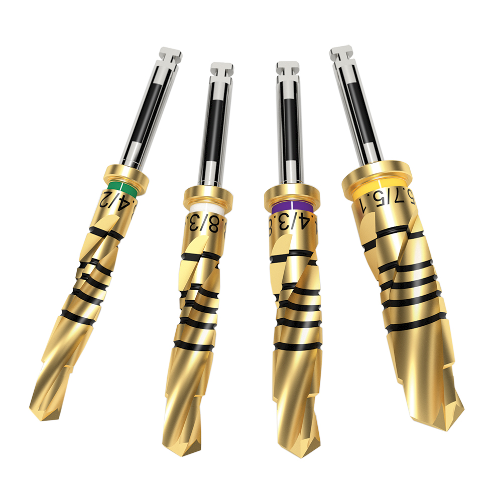 Dríva™ Gold Series Dental Drills Four Dríva™ Gold Series dental drills with gold finish, depth markings, and color-coded rings for precision implant preparation.